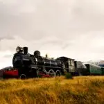 Steam train in a open countryside.